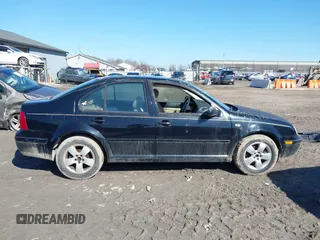 2003 Volkswagen Jetta GLS с VIN 3VWSK69M23M038677, выставлен на аукционе IAAI как лот 41760282 с пробегом 190 583 миль миль и . История ставок и продаж доступна на DreamBid. Изображение 14.