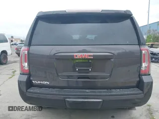 2015 GMC Yukon SLT with VIN 1GKS1BKC6FR245564, listed as a IAAI auction lot 42139295 with 149,088 mi miles. Bid and sale history available at carsss.com. Image 16.
