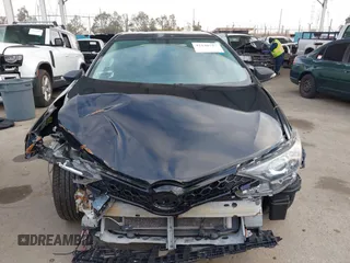 2016 Scion iM with VIN JTNKARJE0GJ507873, listed as a IAAI auction lot 42140717 with 152,554 mi miles. Bid and sale history available at carsss.com. Image 12.