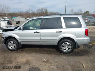 2005 Honda Pilot EX-L with NAVI with VIN 2HKYF18725H534538, listed as a IAAI auction lot 41677322 with 157,987 mi miles. Bid and sale history available at carsss.com. Image 14.
