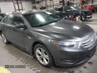 2015 Ford Taurus SEL with VIN 1FAHP2E87FG207029, listed as a IAAI auction lot 41752890 with 119,858 mi miles and . Bid and sale history available at carsss.com. Image 1.