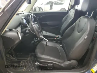 2011 MINI Hardtop with VIN WMWSU3C54BT184251, listed as a Copart auction lot 59298135 with 123,864 mi miles and Salvage title. Bid and sale history available at DreamBid. Image 7.