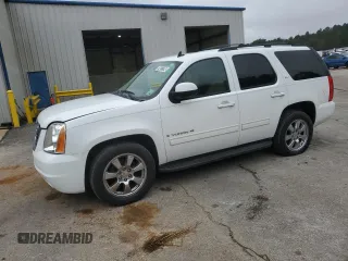 2009 GMC Yukon SLT w/4SA with VIN 1GKEC33349R265859, listed as a Copart auction lot 74012784 with 153,394 mi miles and Clean Title. Bid and sale history available at carsss.com. Image 1.