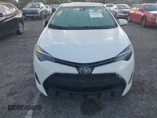 2019 Toyota Corolla L with VIN 2T1BURHE0KC179280, listed as a IAAI auction lot 41944624 with 102,964 mi miles. Bid and sale history available at carsss.com. Image 6.