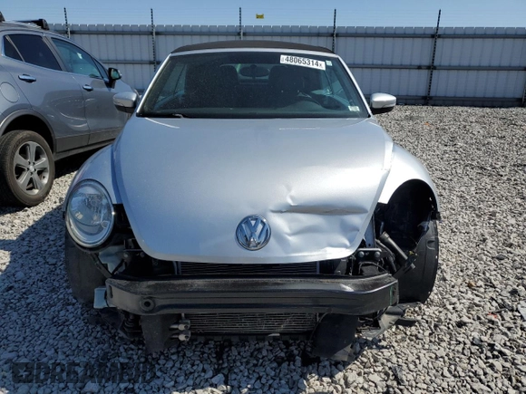 2015 Volkswagen Beetle 1.8T with VIN 3VW517AT8FM810709, listed as a Copart auction lot 48065314 with 61,924 mi miles and Salvage title. Bid and sale history available at DreamBid. Image 5.