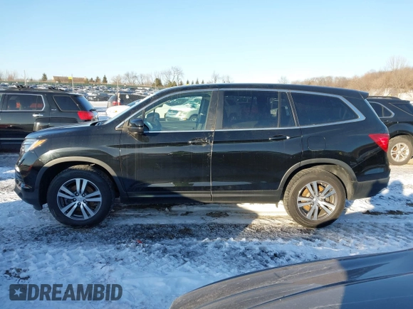 2016 Honda Pilot EX-L with VIN 5FNYF6H7XGB115951, listed as a IAAI auction lot 41642756 with 101,688 mi miles. Bid and sale history available at carsss.com. Image 14.
