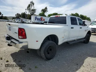 2014 Ram 3500 Tradesman z VIN 3C63RRGJ8EG220695, wystawiony jako Copart lot #57074635 z przebiegiem 162 890 mil mil oraz Tytuł czysty. Historia ofert i sprzedaży dostępna na DreamBid. Obrazek 3.