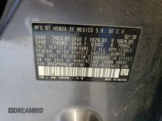 2020 Honda Fit LX z VIN 3HGGK5H46LM710780, wystawiony jako Copart lot #53032525 z przebiegiem 102 541 mil mil oraz Szkoda całkowita • Salvage title. Historia ofert i sprzedaży dostępna na DreamBid. Obrazek 14.