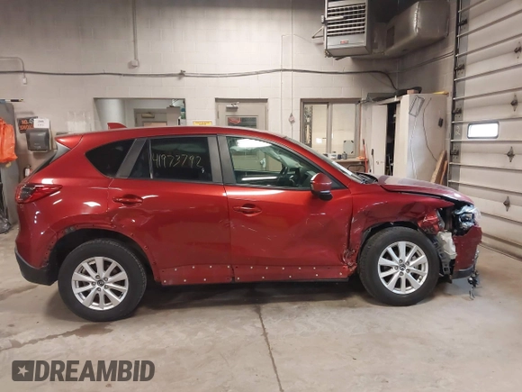 2013 Mazda CX-5 Touring with VIN JM3KE4CEXD0120913, listed as a IAAI auction lot 41973792 with 129,202 mi miles. Bid and sale history available at carsss.com. Image 13.