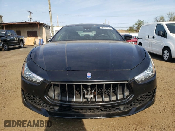2018 Maserati Ghibli S Q4 z VIN ZAM57YTA5J1279909, wystawiony jako Copart lot #54559285 z przebiegiem 49 065 mil mil oraz Szkoda całkowita • Salvage title. Historia ofert i sprzedaży dostępna na DreamBid. Obrazek 5.