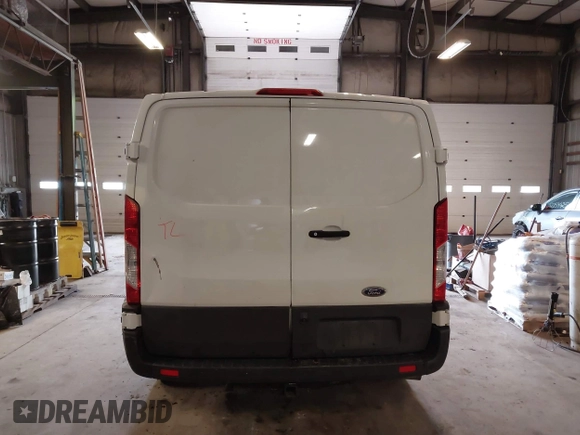 2021 Ford Transit Cargo with VIN 1FTBR1Y87MKA76372, listed as a IAAI auction lot 42251675 with 98,072 mi miles and . Bid and sale history available at DreamBid. Image 16.