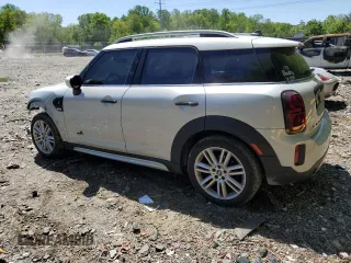 2023 MINI Countryman Cooper S with VIN WMZ83BR0XP3P91056, listed as a Copart auction lot 54699605 with 22,049 mi miles and Salvage title. Bid and sale history available at DreamBid. Image 2.