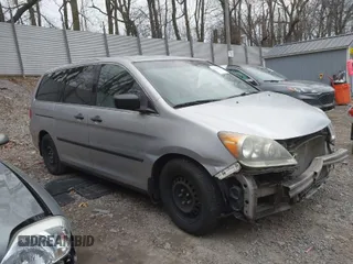 2010 Honda Odyssey LX with VIN 5FNRL3H26AB008709, listed as a IAAI auction lot 41836230 with 168,267 mi miles. Bid and sale history available at carsss.com. Image 1.