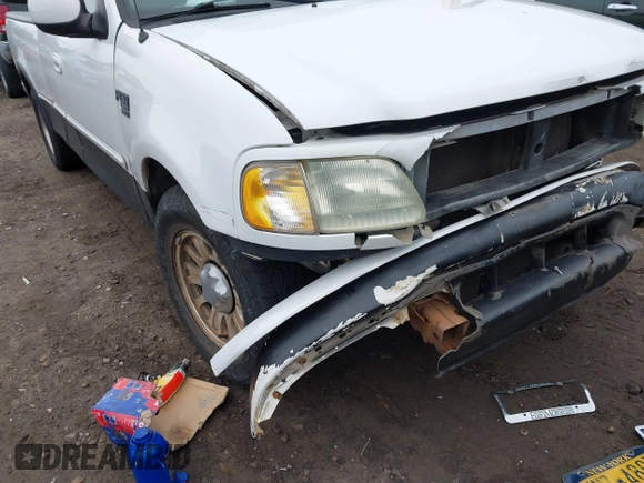 2003 Ford F-150 XL with VIN 1FTRX17W73NA42322, listed as a IAAI auction lot 41680100 with 129,295 mi miles. Bid and sale history available at carsss.com. Image 12.