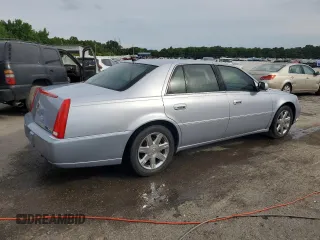 2006 Cadillac DTS 1SC z VIN 1G6KD57Y36U186630, wystawiony jako Copart lot #60792235 z przebiegiem 137 670 mil mil oraz Czysty tytuł • Clean title. Historia ofert i sprzedaży dostępna na DreamBid. Obrazek 3.