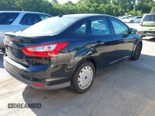 2013 Ford Focus SE z VIN 1FADP3F25DL115727, wystawiony jako IAAI lot #42609895 z przebiegiem 163 749 mil mil oraz . Historia ofert i sprzedaży dostępna na DreamBid. Obrazek 4.