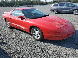 1996 Pontiac Firebird Firebird z VIN 2G2FS22KXT2220333, wystawiony jako Copart lot #77640324 z przebiegiem 89 032 mil mil oraz Nie do naprawy • Non repairable. Historia ofert i sprzedaży dostępna na DreamBid. Obrazek 4.