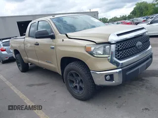2018 Toyota Tundra SR z VIN 5TFUY5F17JX775105, wystawiony jako IAAI lot #42260441 z przebiegiem 71 156 mil mil oraz . Historia ofert i sprzedaży dostępna na DreamBid. Obrazek 1.