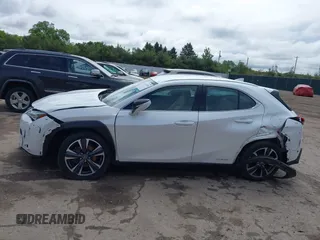 2021 Lexus UX 250h with VIN JTHX9JBH5M2051466, listed as a IAAI auction lot 42318286 with 40,109 mi miles and . Bid and sale history available at DreamBid. Image 14.