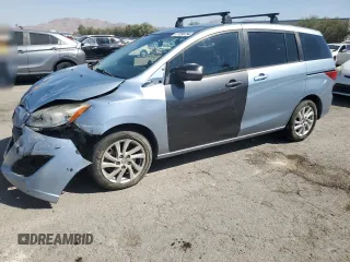 2012 Mazda 5 Sport with VIN JM1CW2BL2C0143227, listed as a Copart auction lot 71596794 with 231,473 mi miles and Salvage Title. Bid and sale history available at DreamBid. Image 1.