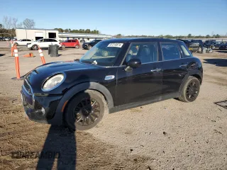 2015 MINI Cooper Hardtop 4 Door S with VIN WMWXU3C53F2B66599, listed as a Copart auction lot 87310874 with 101,726 mi miles and Salvage Title. Bid and sale history available at carsss.com. Image 1.