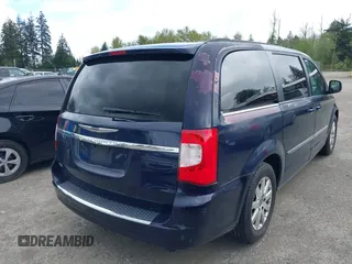 2014 Chrysler Town & Country Touring with VIN 2C4RC1BG0ER211050, listed as a IAAI auction lot 42086523 with 131,434 mi miles. Bid and sale history available at carsss.com. Image 6.