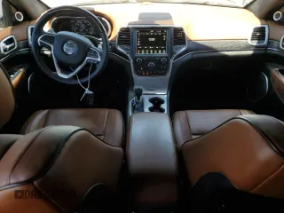 2018 Jeep Grand Cherokee Summit with VIN 1C4RJEJG9JC212554, listed as a Copart auction lot 63123065 with 82,976 mi miles and Salvage title. Bid and sale history available at DreamBid. Image 8.