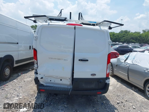 2024 Ford Transit Cargo with VIN 1FTBR1Y89RKA77093, listed as a IAAI auction lot 42556386 with 3,290 mi miles and . Bid and sale history available at DreamBid. Image 16.