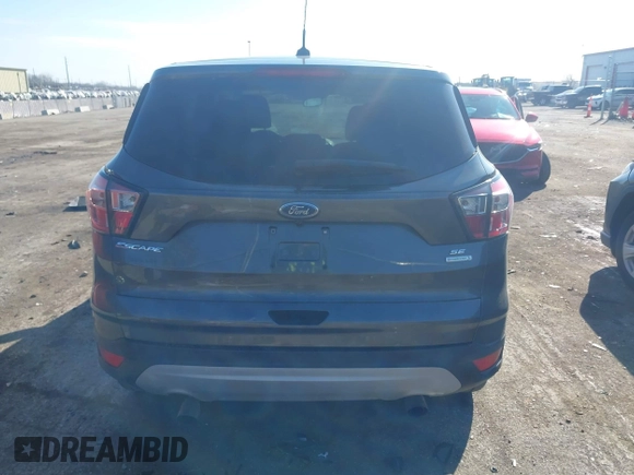 2017 Ford Escape SE with VIN 1FMCU0GD0HUB80123, listed as a IAAI auction lot 41895514 with 61,680 mi miles and . Bid and sale history available at DreamBid. Image 16.