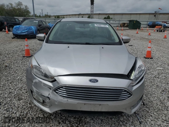 2016 Ford Focus Titanium with VIN 1FADP3J22GL354941, listed as a Copart auction lot 54401135 with 144,142 mi miles and Salvage title. Bid and sale history available at DreamBid. Image 5.