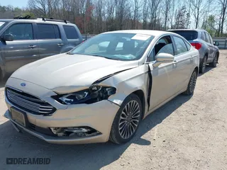 2018 Ford Fusion Titanium with VIN 3FA6P0D93JR233361, listed as a IAAI auction lot 41908259 with 202,949 mi miles. Bid and sale history available at carsss.com. Image 2.