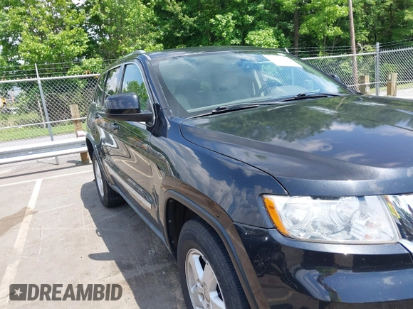 2011 Jeep Grand Cherokee Laredo with VIN 1J4RS4GG5BC534960, listed as a IAAI auction lot 42277395 with 223,690 mi miles and . Bid and sale history available at DreamBid. Image 6.
