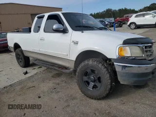 2001 Ford F-150 XL with VIN 1FTRX17L21NA52159, listed as a Copart auction lot 86756384 with Not provided miles and Salvage title. Bid and sale history available at DreamBid. Image 4.