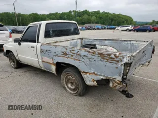 1988 Toyota Pickup z VIN JT4RN50R0J5122639, wystawiony jako Copart lot #52792445 z przebiegiem 233 407 mil mil oraz Szkody całkowita. Historia ofert i sprzedaży dostępna na DreamBid. Obrazek 2.