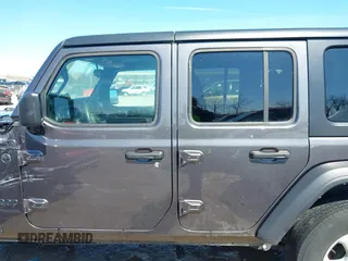 2022 Jeep Wrangler Unlimited Willys with VIN 1C4HJXDN1NW144112, listed as a IAAI auction lot 41867571 with 63,876 mi miles and . Bid and sale history available at DreamBid. Image 15.
