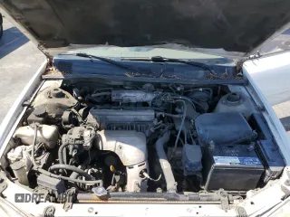 1997 Toyota Camry LE z VIN JT2BG22K9V0002215, wystawiony jako Copart lot #56932955 z przebiegiem 265 776 mil mil oraz Szkoda całkowita • Salvage title. Historia ofert i sprzedaży dostępna na DreamBid. Obrazek 11.