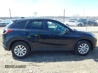2013 Mazda CX-5 Touring with VIN JM3KE2CE3D0102368, listed as a IAAI auction lot 41783079 with 162,646 mi miles and . Bid and sale history available at carsss.com. Image 13.