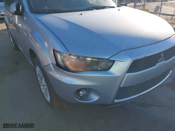 2010 Mitsubishi Outlander SE with VIN JA4AS3AW4AZ009939, listed as a IAAI auction lot 41689188 with 144,480 mi miles. Bid and sale history available at carsss.com. Image 6.