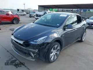 2023 Tesla Model Y Long Range with VIN 7SAYGDEEXPA078629, listed as a IAAI auction lot 42046354 with 27,245 mi miles and . Bid and sale history available at DreamBid. Image 21.