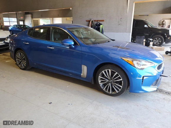 2019 Kia Stinger with VIN KNAE15LA2K6051145, listed as a Copart auction lot 56882864 with 70,295 mi miles and Salvage Title. Bid and sale history available at carsss.com. Image 4.
