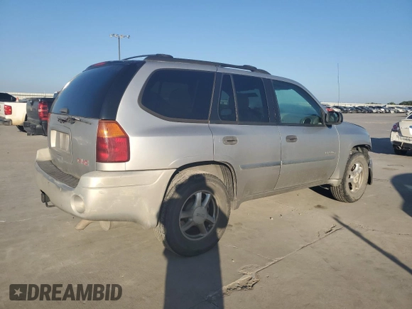 2006 GMC Envoy SLE with VIN 1GKDS13S962219216, listed as a Copart auction lot 71656164 with 328,966 mi miles and Salvage Title. Bid and sale history available at carsss.com. Image 3.