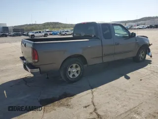 2002 Ford F-150 XL with VIN 1FTRX17222KA58070, listed as a Copart auction lot 52186295 with 0 mi miles and Salvage Title. Bid and sale history available at carsss.com. Image 3.
