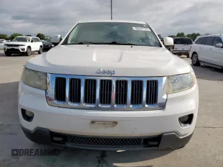 2011 Jeep Grand Cherokee Laredo z VIN 1J4RR4GG2BC617810, wystawiony jako Copart lot #62424125 z przebiegiem 205 945 mil mil oraz Szkoda całkowita • Salvage title. Historia ofert i sprzedaży dostępna na DreamBid. Obrazek 5.