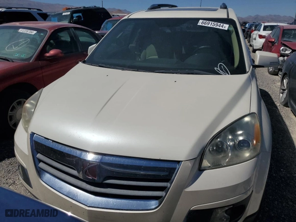 2007 Saturn Outlook XR with VIN 5GZEV23717J174383, listed as a Copart auction lot 66915944 with 128,885 mi miles and Salvage Title. Bid and sale history available at carsss.com. Image 5.