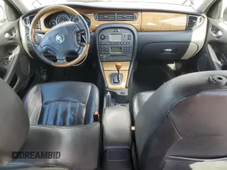 2004 Jaguar X-Type with VIN SAJEA51C74WD56736, listed as a Copart auction lot 48038295 with 115,817 mi miles and Salvage Title. Bid and sale history available at DreamBid. Image 8.