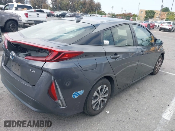 2021 Toyota Prius LE with VIN JTDKAMFP0M3193305, listed as a IAAI auction lot 42283494 with 322,523 mi miles and . Bid and sale history available at DreamBid. Image 4.