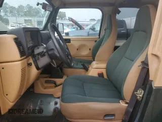 1997 Jeep Wrangler Sahara with VIN 1J4FY49SXVP453369, listed as a Copart auction lot 72826744 with 145,852 mi miles and Salvage Title. Bid and sale history available at carsss.com. Image 7.