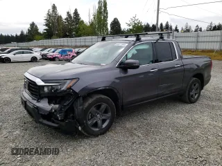 2021 Honda Ridgeline RTL-E with VIN 5FPYK3F71MB016967, listed as a Copart auction lot 53371544 with 34,382 mi miles and Salvage title. Bid and sale history available at DreamBid. Image 1.