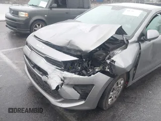 2022 Kia Rio S with VIN 3KPA25AD9NE500847, listed as a IAAI auction lot 41516061 with 38,828 mi miles and . Bid and sale history available at DreamBid. Image 6.