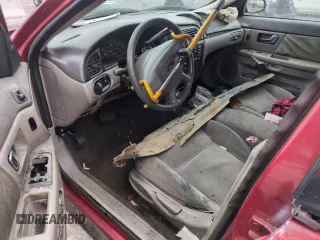 2001 Ford Taurus LX with VIN 1FAFP52UX1A176008, listed as a Copart auction lot 58983935 with 123,985 mi miles and Salvage title. Bid and sale history available at DreamBid. Image 8.